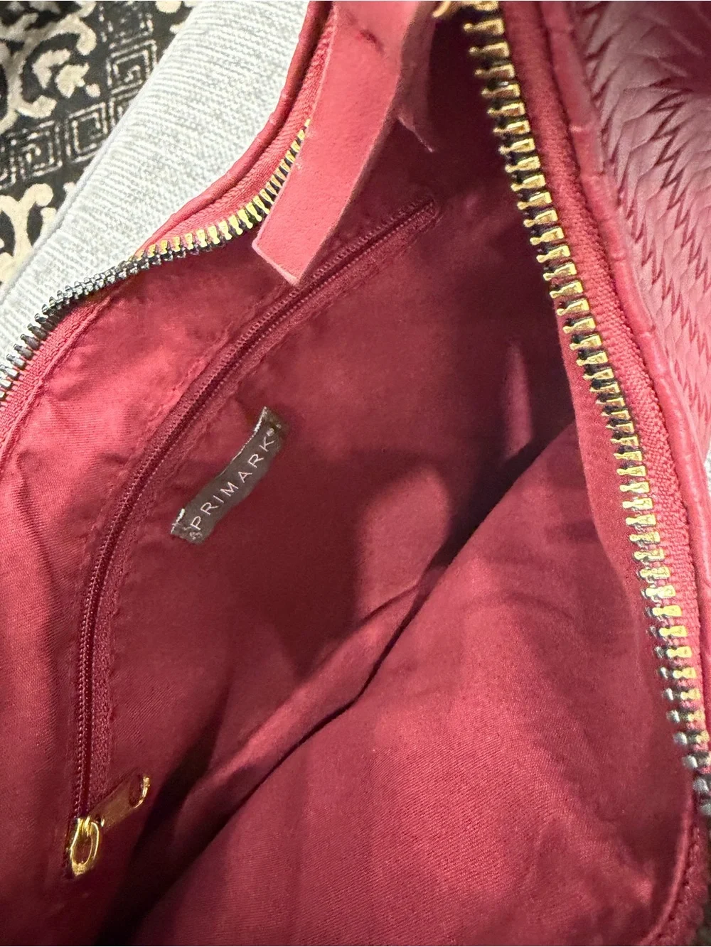 Primark Woven Crescent Shoulder Bag in Berry